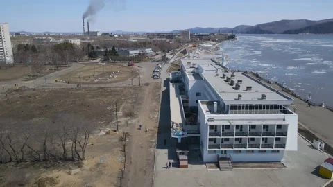 Ice Drift Occurs on a River next to the River Station in City Stock-Footage 194345073