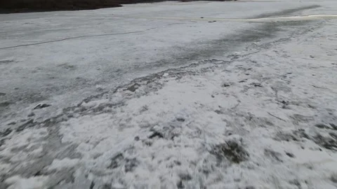 Ice Drift Occurs on the River next to the Island cover Forest and a Mountain Stock Footage 194345178
