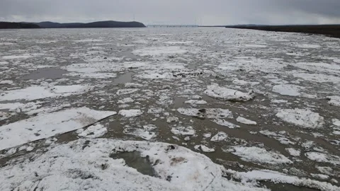 Ice Drift Occurs on the River next to the Island Stock-Footage 194345279