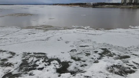 Ice Drift Occurs on a River next to a Port Stock Footage 194345384