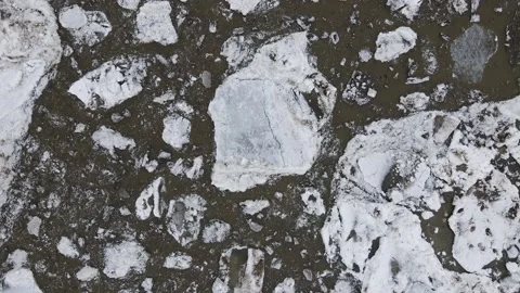 Ice Drift Occurs on the River next to a Island with Forest Stock Footage 194345469
