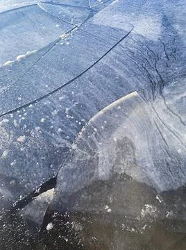 Ice drift, spring ice on the river, selective focus Stock Photos