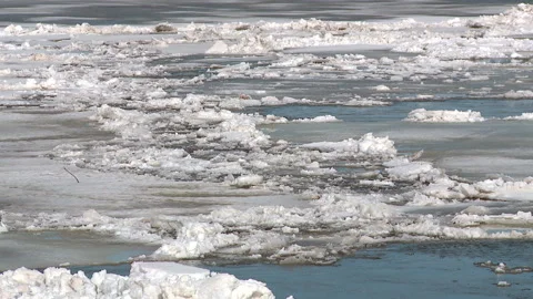 Ice drift in the spring on the river ice floes accumulate in the congestion Stock Footage 88675814