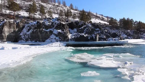 Ice drift on the turquoise river in the spring Stock Footage 72492531