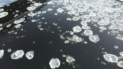 Ice Drift In Vilnius, Lithuania. River Neris. Ice Floes Float On The River Stock Footage 167700285