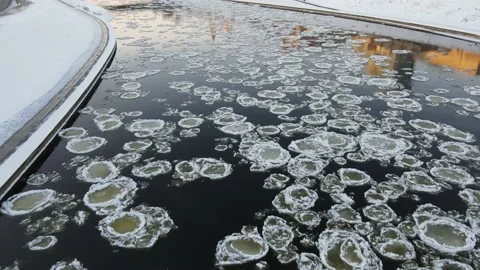 Ice Drift In Vilnius, Lithuania. River Neris. Ice Floes Float On The River Stock Footage 167703530