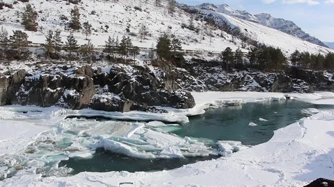 Ice drifting on the turquoise river in the spring Stock Footage 74723507
