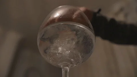 Ice Dropping Into Glass Slow Motion 2 Video stock 101715873