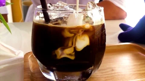 Ice espresso with milk Stock Footage 79591697