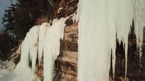 Ice fall on cliff Stock Footage 100126245
