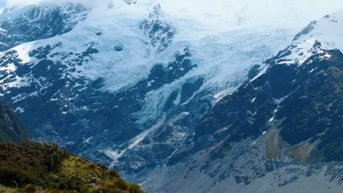 Ice falling from Glacier Stock Footage 260367734