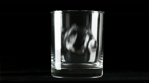 Ice falling in a glass 스톡 동영상 493419