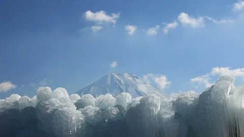 Ice Falls, Flowing Clouds, and Mount Fuji Stock Footage 324966149