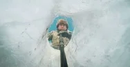 Ice Fishing Holes Beneath Frozen Lake Underwater Stock Footage