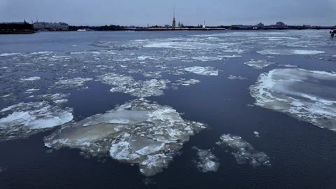 Ice floats on a big river in a big city 스톡 동영상 328730138