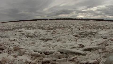 Ice floats on the river. Ice drift in the spring. Stock Footage 123353202
