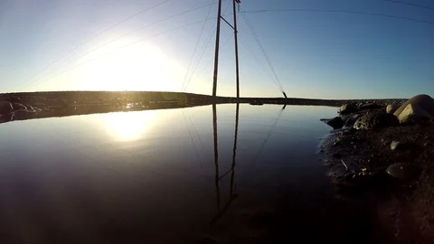 Ice floats on the water under the bridge in Eyrarbakki Iceland Stock Footage 118279000