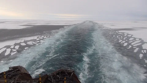 Ice floe broken by a boat in the Arctic Ocean, North Pole Stock Footage 104874707