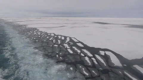 Ice floe broken by a boat in the Arctic Ocean, North Pole Video stock 104874792