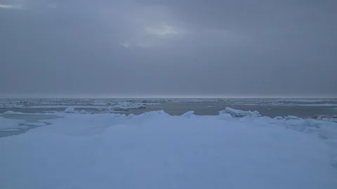 Ice floe under a cloudy sky, Arctic Ocean Video stock 104923138