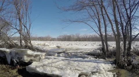 Ice flow on Maumee river seen over a huge chunk of ice Stock-Footage 49750250
