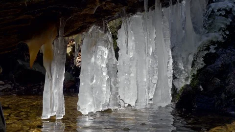 Ice in forest stream thawing in spring Stock-Footage 88899144