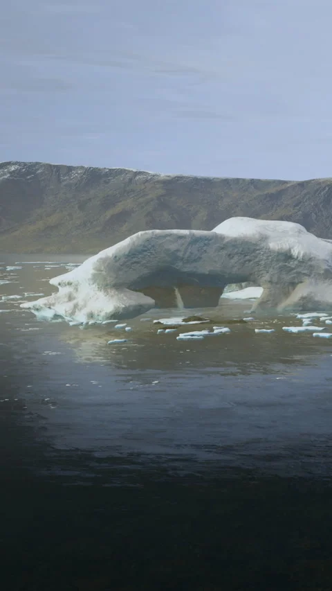Ice formation in a cold landscape with mountains and water in the background Stock Footage 335946521