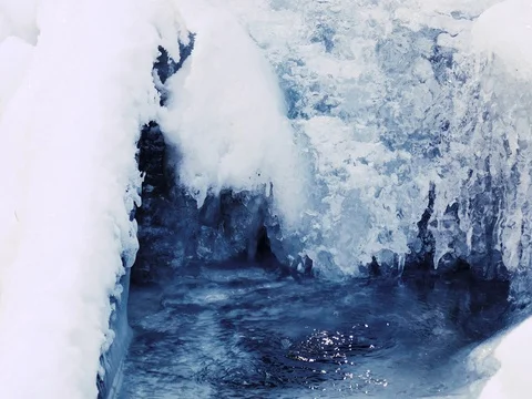 Ice Formations over a Small Pond Stock Footage 73549990