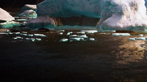 Ice formations on water surface in a cold landscape during daylight hours Stock Footage 340025631
