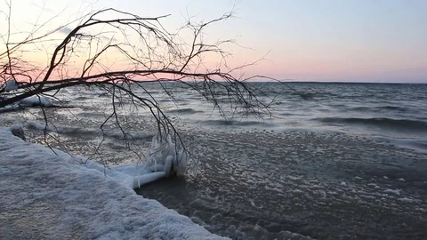 Ice in a freezing river in the fall at sunset, Ob reservoir,  Russia Stock Footage 83300440