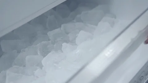 Ice in fridge in slow motion Stock Footage 73597690