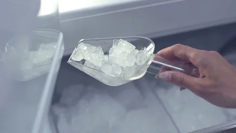 Ice in fridge in sow motion Stock Footage 73597824