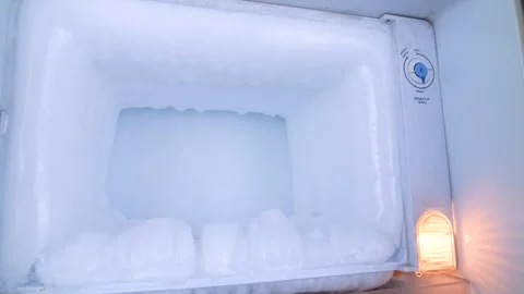 Ice full in empty freezer of a refrigerator. dolly forward shot Stock Footage 281577482