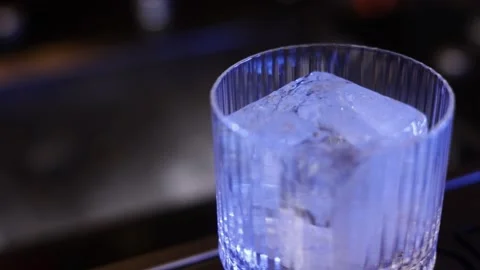 Ice in a glass bar Stock Footage 168294821
