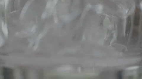 Ice into glass Stock Footage 163442559