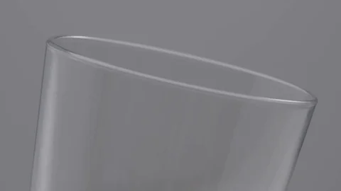 Ice into a glass slow motion Stock Footage 74103407