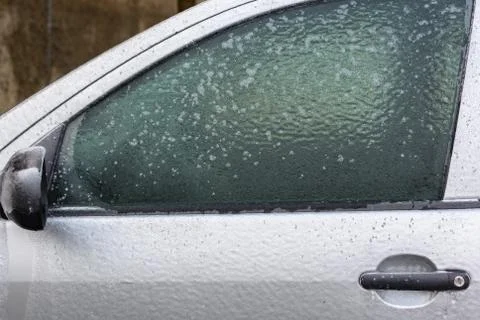 Ice glazed car window Stock Photos