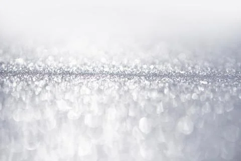 Ice glitter texture with luminous shimmer. Ice abstract white sparkle background Stock Photos