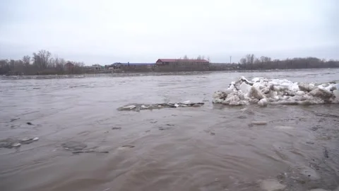 Ice goes down the river during a flood on the Belaya River in Ufa. Stock Footage 277594519