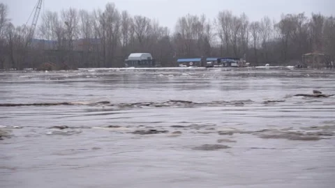 Ice goes down the river during a flood on the Belaya River in Ufa. Video stock 282732206