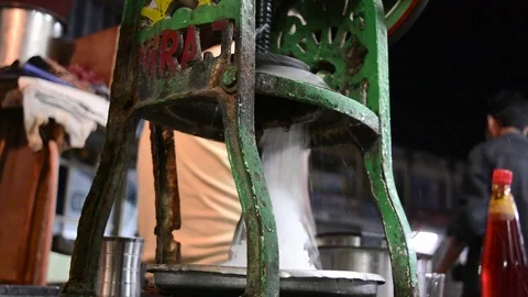 Ice grinding in ice crusher machine Stock Footage 70344627