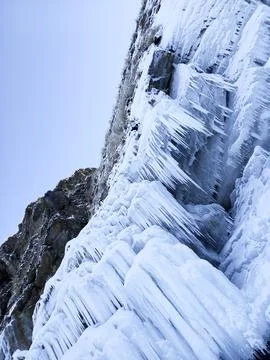 Ice hanging from the mountain Stock Photos