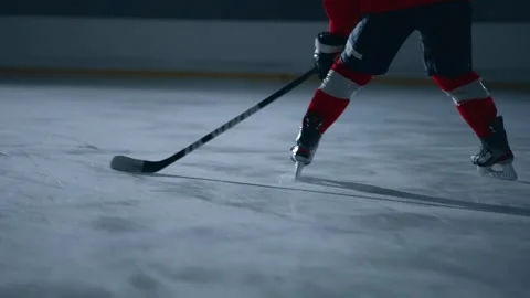 Ice Hockey Player Training Attack On Ice Rink Arena, Closeup View Of Skates and Stock Footage 243342933