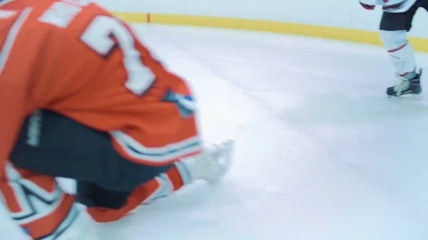 Ice hockey player tricks the player and passes on to the teammate Stock Footage 81439261