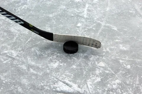 Ice Hockey Stick Puck Outdoor Ice Stock Photos