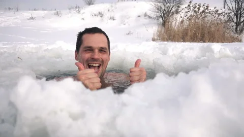 ice hole swimming | Stock Video | Pond5