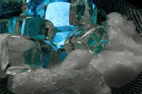 Ice in an ice bucket Stock Photos