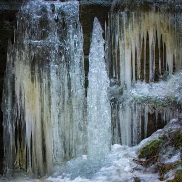 Ice, icicles in water Stock Photos