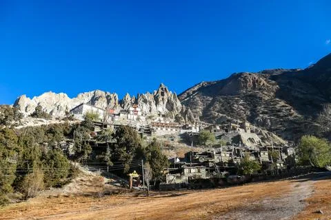 Ice Lake - A temple complex on the side of the hill in Manang Stock Photos