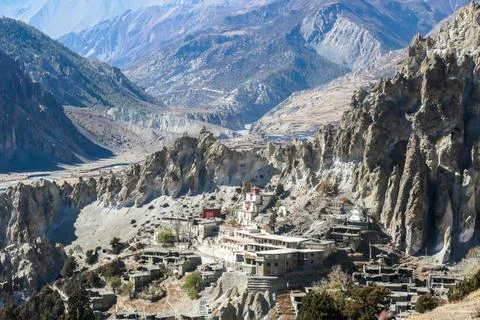 Ice Lake - A temple complex on the side of the hill in Manang Stock Photos